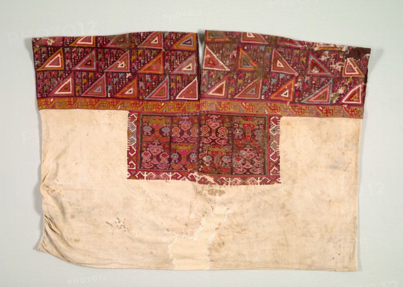 Tunic (Shirt) with Tapestry-woven Yoke, 650-850. Central Andes, Northern Central Coast. Camelid fiber and cotton; tapestry-weave yoke and chest plaque, plain-weave body; overall: 76.2 x 108 cm (30 x 42 1/2 in.)