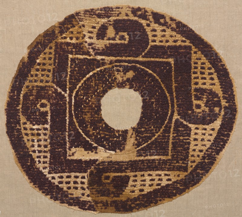 Looped Roundel from a Blanket or Cover, 300s-400s. Egypt, Byzantine period, 4th - 6th century. Tapestry weave with supplementary weft wrapping; undyed linen and dyed wool; overall: 49.5 x 55.3 cm (19 1/2 x 21 3/4 in.)