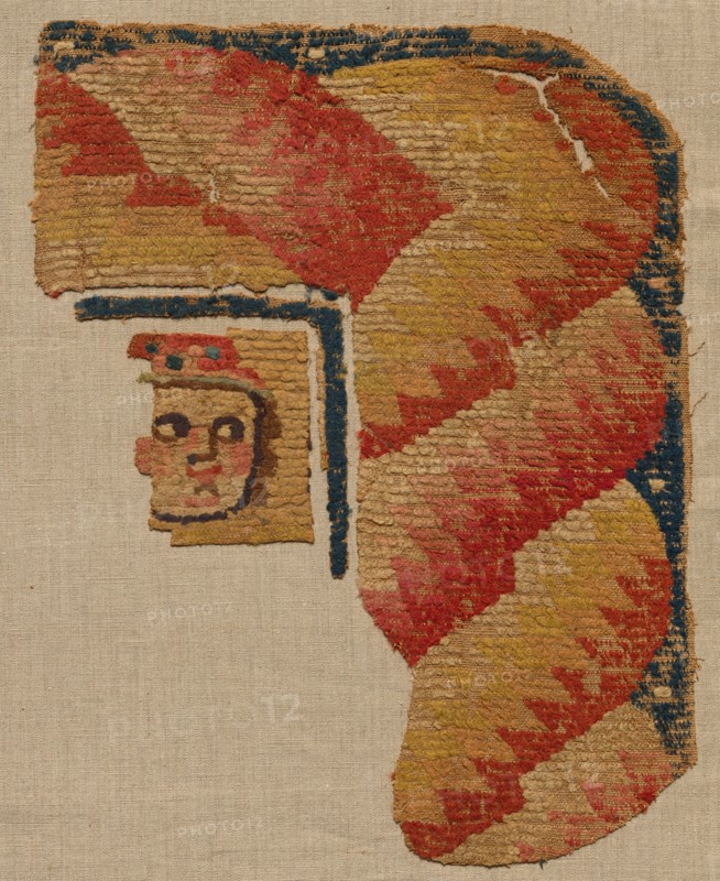 Fragment, Probably an Ornament from a Large Curtain, late 400s. Egypt, Byzantine period, late 5th century. Looped-weft weave; linen and wool; overall: 46.1 x 35.6 cm (18 1/8 x 14 in.).