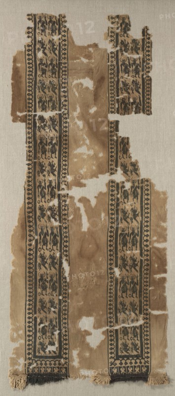 Fragment of a Tunic, 400s - 600s. Egypt, Byzantine period, 5th - 7th century. Tabby ground, inwoven tapestry ornament; wool; overall: 39.7 x 93 cm (15 5/8 x 36 5/8 in.)