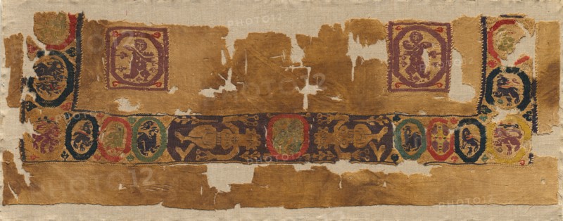 Fragment of a Tunic, 600 - 650. Egypt, Byzantine period, first half of 7th century. Tabby weave with inwoven tapestry ornament, linen and wool; overall: 26.1 x 74.3 cm (10 1/4 x 29 1/4 in.)