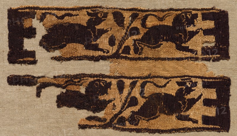 Fragment, Sleeve Ornament from a Tunic, 500s. Egypt, Byzantine period, 6th century. Tapestry (originally inwoven in tabby ground); linen and wool; overall: 13.4 x 23.9 cm (5 1/4 x 9 7/16 in.)