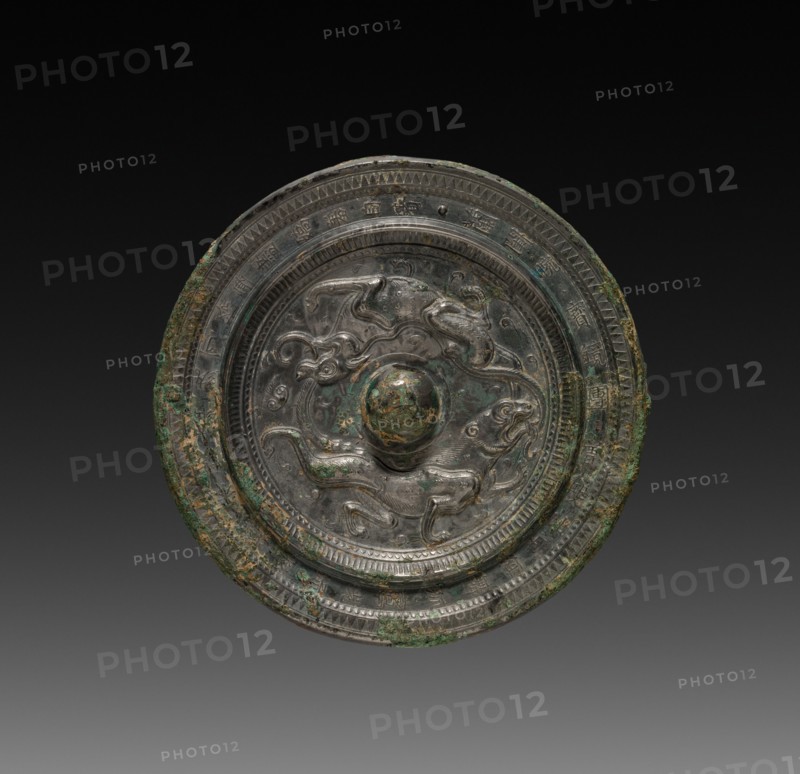 Mirror with Paired Felines, late 6th-7th Century. China, Sui dynasty (581-618) - Tang dynasty (618-907). Bronze; diameter: 14.5 cm (5 11/16 in.).