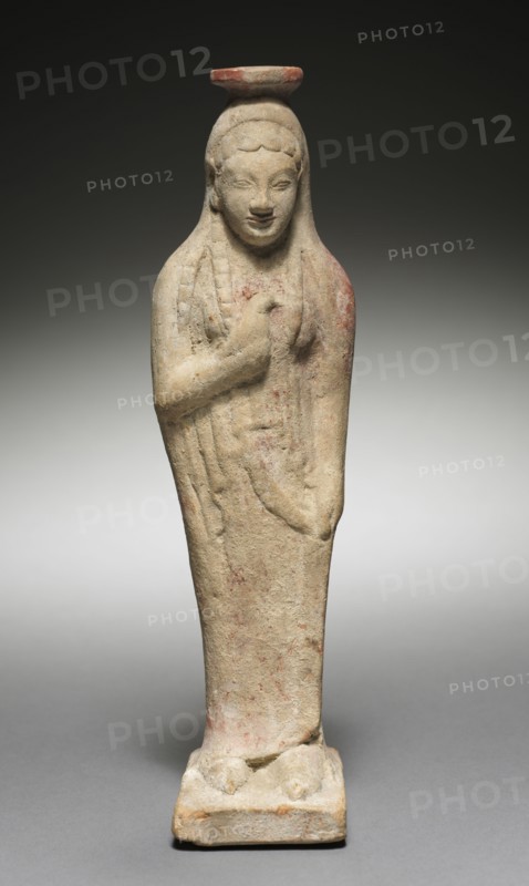 Kore Holding a Dove, 525-500 BC. Greece, Rhodes, late 6th Century BC. Terracotta; overall: 23 cm (9 1/16 in.).