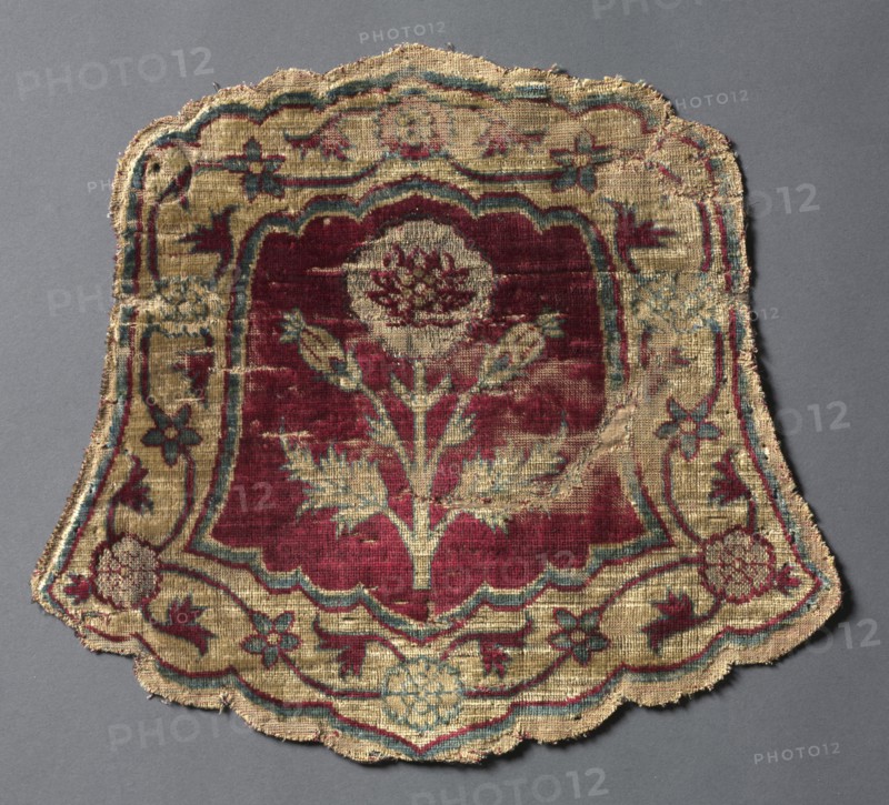 Shaped horse trapping, 1600s. India. Velvet, brocaded and pile warp substitution: silk and gilt-metal thread; average: 26.1 x 23.5 cm (10 1/4 x 9 1/4 in.)