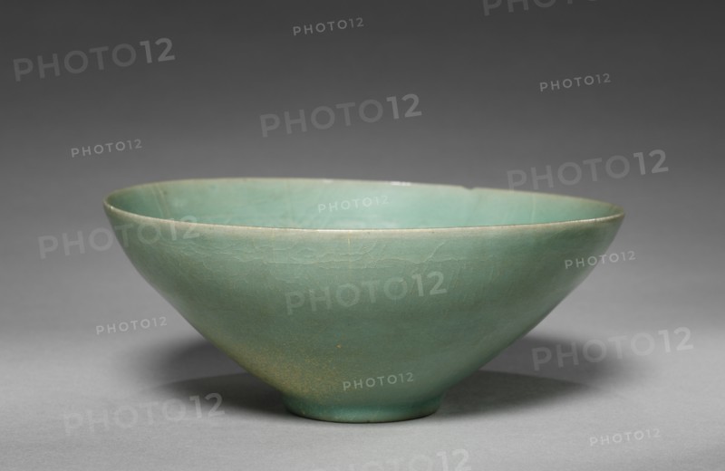 Bowl with Flowering Vines Design in Relief, 1100s-1200s. Korea, Goryeo period (918-1392). Celadon ware; diameter of mouth: 10.9 cm (4 5/16 in.); overall: 7.6 cm (3 in.).