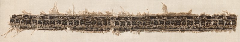 Fragment of a Tiraz-Style Textile, 1101 - 1130. Egypt, Fatimid period, probably Caliphate of al-Amir, AH 495-524, 12th Century. Tabby ground with inwoven tapestry ornament; linen and silk; overall: 3.9 x 31.8 cm (1 9/16 x 12 1/2 in.)
