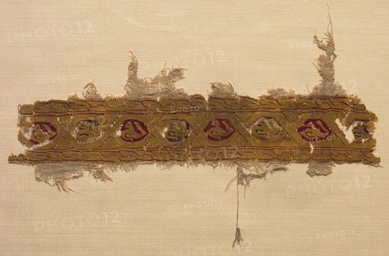 Fragment of a Tiraz-Style Textile, 1130 - 1169. Egypt, Fatimid period, Caliphate of al-Hafiz or later, AH 524-565, 12th Century. Tabby ground with inwoven tapestry ornament; linen and silk; overall: 13.4 x 21 cm (5 1/4 x 8 1/4 in.).