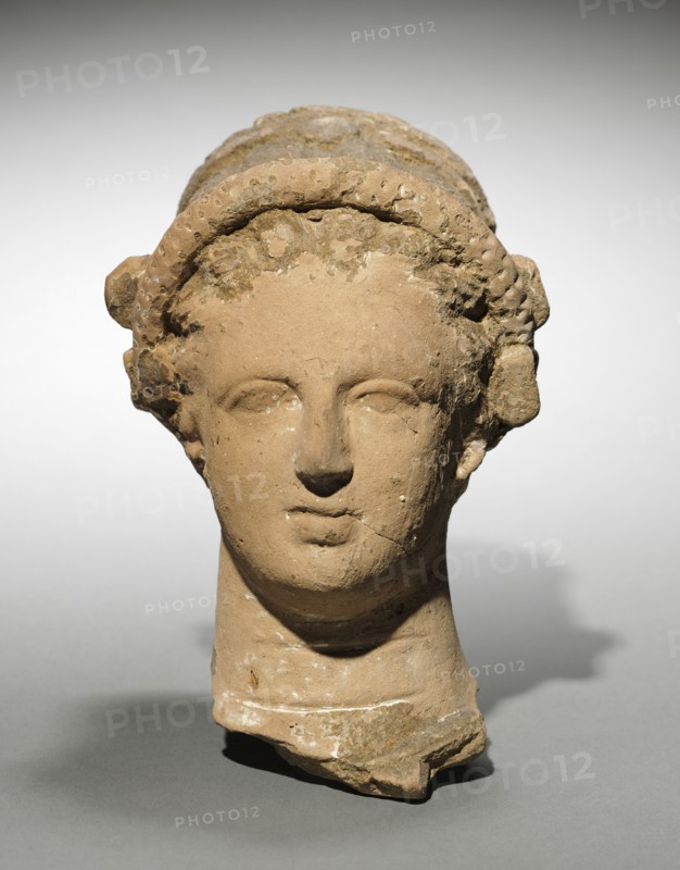 Head of a Woman, 400s BC. Greece, 5th Century BC. Terracotta; overall: 16.5 cm (6 1/2 in.).