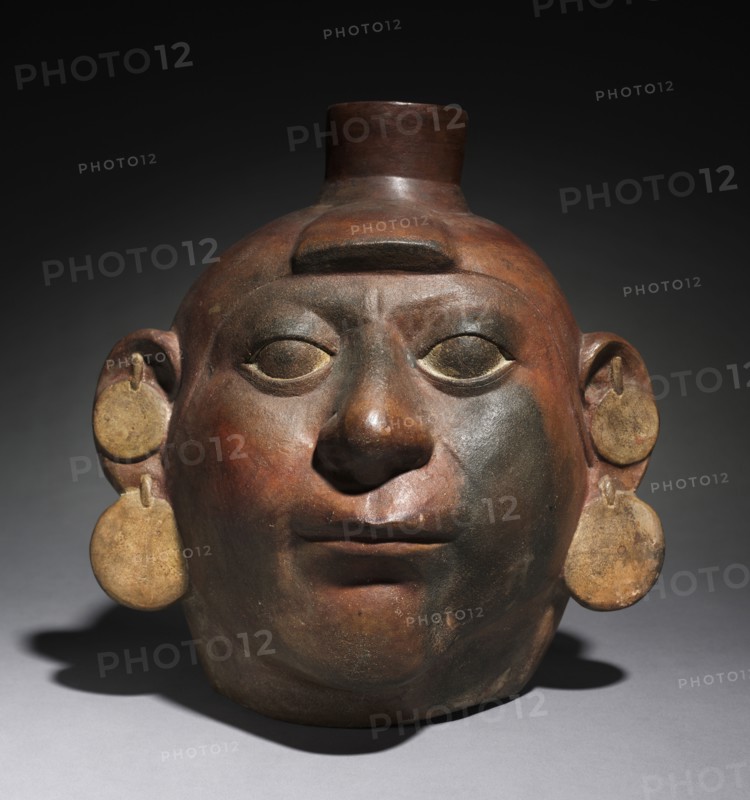 Portrait Head Vessel, 200-550. Peru, North Coast, Moche style (50-800). Earthenware with colored slips; overall: 30.5 x 28.9 x 25 cm (12 x 11 3/8 x 9 13/16 in.).