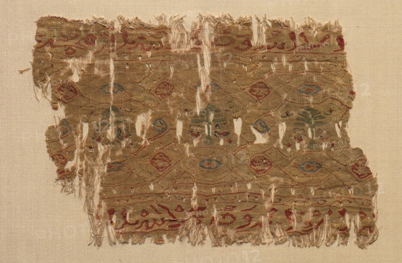 Fragment of a Tiraz, 1130 - 1149. Egypt, Fatimid period, probably during Caliphate of al-Hafiz, AH 524-544 (A.D. 1130-1149). Tapestry (originally inwoven in a tabby ground); linen and silk; overall: 11.5 x 17.2 cm (4 1/2 x 6 3/4 in.).