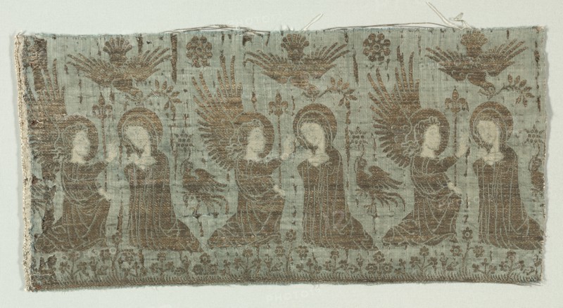 Textile Fragment with the Annunciation, 1370-1400. Italy. Silk with gold thread; lampas weave; overall: 46.4 x 22.9 cm (18 1/4 x 9 in.).