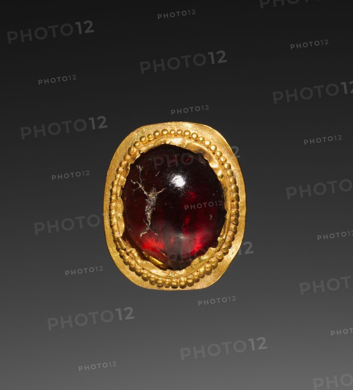 Garnet, 1-200. Parthian, 1st-2nd Century. Gold and garnet; overall: 0.3 x 0.8 x 0.9 cm (1/8 x 5/16 x 3/8 in.); with mount: 0.3 x 0.8 x 2.4 cm (1/8 x 5/16 x 15/16 in.).