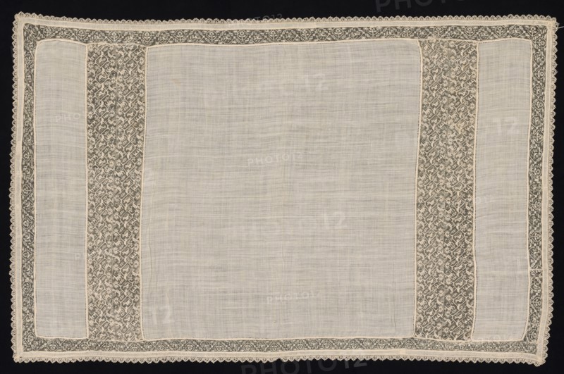 Cloth with Winged and Two-Tailed Animals, 17th-18th century. Italy, 17th-18th century. Plain weave linen with needle lace, filet/lacis (knotted ground and darned in two directions) and bobbin lace edging; bleached linen (est.); overall: 88.3 x 137.5 cm (34 3/4 x 54 1/8 in.)