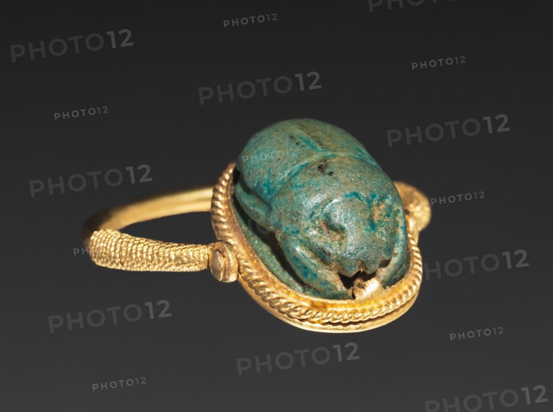 Scarab Ring, 1540-1069 BC. Egypt, New Kingdom. Turquoise faience (mounted on swivel bezel in modern gold ring); diameter: 2.2 cm (7/8 in.); diameter including bezel: 1.2 cm (1/2 in.).