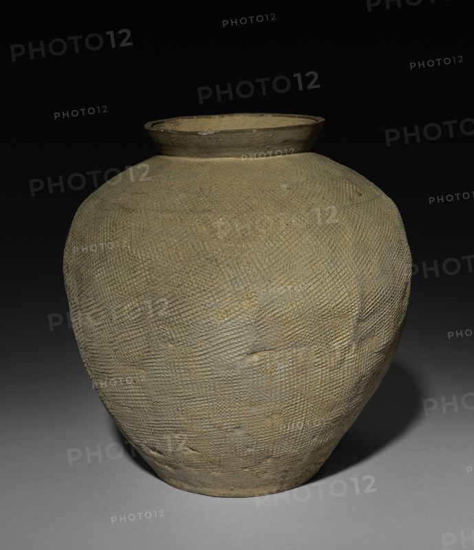 Jar, 481-221. China, reportedly Ch'angsha, Hunan province, Eastern Zhou dynasty (771-256 BC), Warring States period (475-221 BC). Earthenware with stamped decoration; diameter of mouth: 12.8 cm (5 1/16 in.); overall: 25.7 cm (10 1/8 in.).