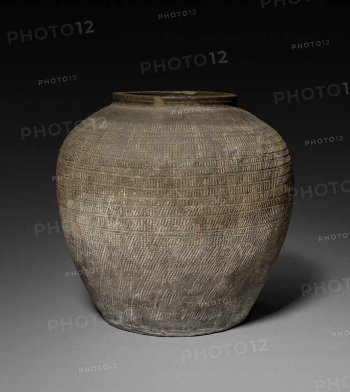 Jar, 481-221. China, reportedly Ch'angsha, Hunan province, Eastern Zhou dynasty (771-256 BC), Warring States period (475-221 BC). Earthenware with impressed and incised decoration; diameter of mouth: 23 cm (9 1/16 in.); overall: 41 cm (16 1/8 in.).