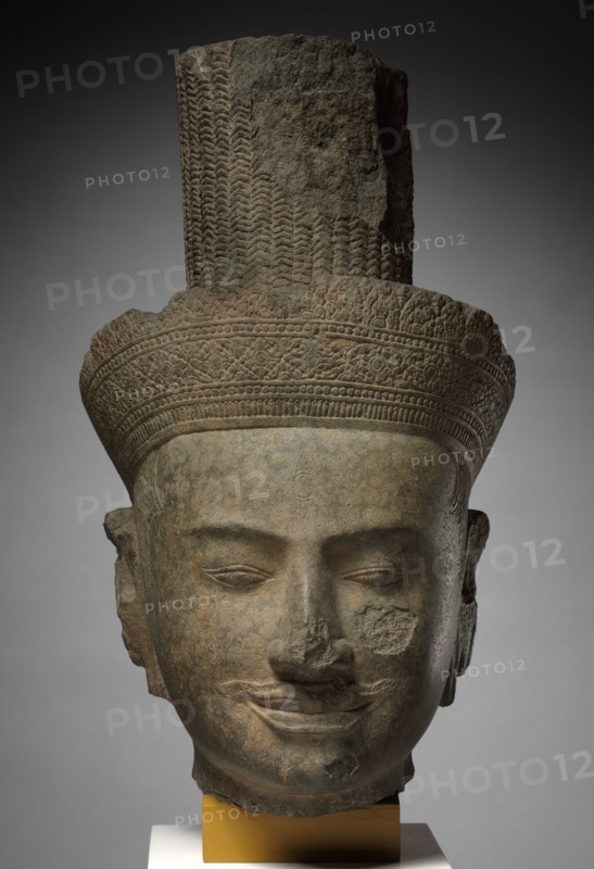 Head of Shiva, 1100s. Cambodia, Angkor, 12th century. Sandstone; with base: 42 cm (16 9/16 in.)