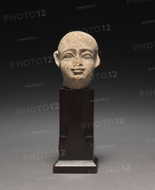Small Head of a Man, 305-30 BC. Egypt, Ptolemaic Dynasty. Limestone; overall: 4.2 x 3.3 x 4.4 cm (1 5/8 x 1 5/16 x 1 3/4 in.).