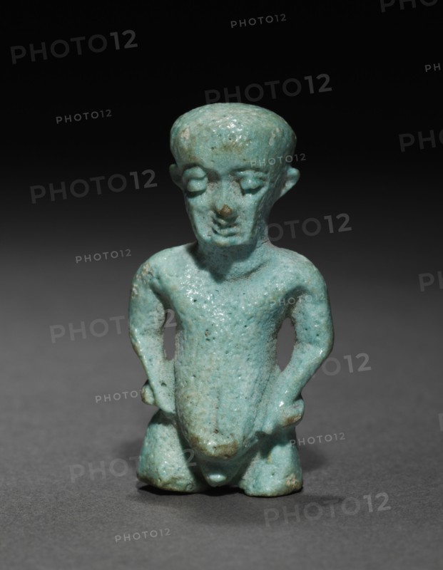 Amulet of Pataikos, 305-30 BC. Egypt, Ptolemaic Dynasty. Pale blue faience; overall: 3.9 x 2 x 1.4 cm (1 9/16 x 13/16 x 9/16 in.).