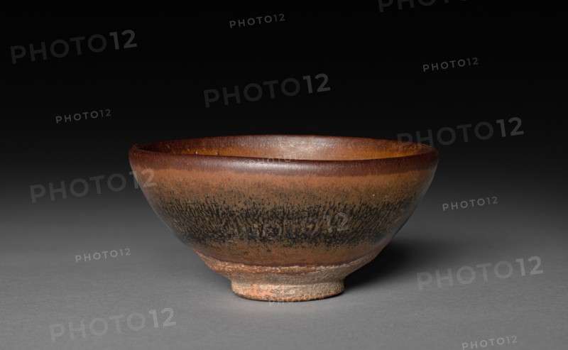 Tea Bowl: Jian ware, 960-1279. China, near Shui ch'i, Song dynasty (960-1279). Purplish brown stoneware with iron slip glaze coating; diameter: 9 cm (3 9/16 in.); overall: 4.6 cm (1 13/16 in.)