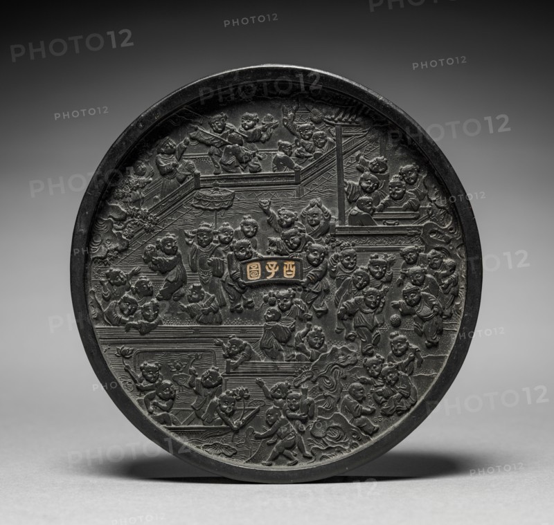 Ink Cake with One Hundred Children at Play, 1368-1644. China, Ming dynasty (1368-1644). Molded ink; diameter: 12.8 cm (5 1/16 in.); overall: 2 cm (13/16 in.).