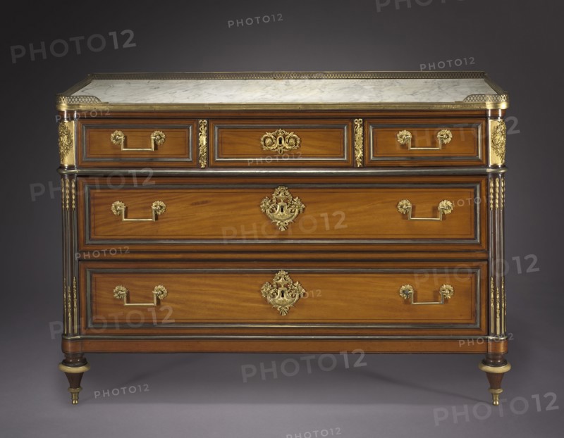 Chest of Drawers, c. 1775-1792. Attributed to Claude-Charles Saunier (French, 1735-1807), mounts in the style of Pierre Joseph Désiré Gouthière (French, 1732-1813/14). Oak, coralwood, mahogany veneer, marble top, gilt bronze mounts; overall: 90.8 x 131.5 x 59.7 cm (35 3/4 x 51 3/4 x 23 1/2 in.).