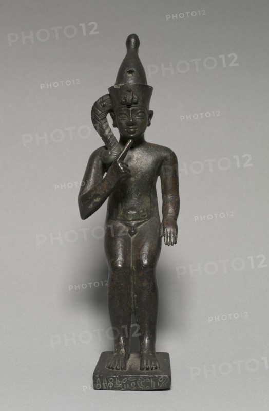 Statuette of Harpocrates, 304-30 BC. Egypt, Greco-Roman Period, Ptolemaic Dynasty. Bronze, solid cast; overall: 18.6 x 5.7 x 10.5 cm (7 5/16 x 2 1/4 x 4 1/8 in.).
