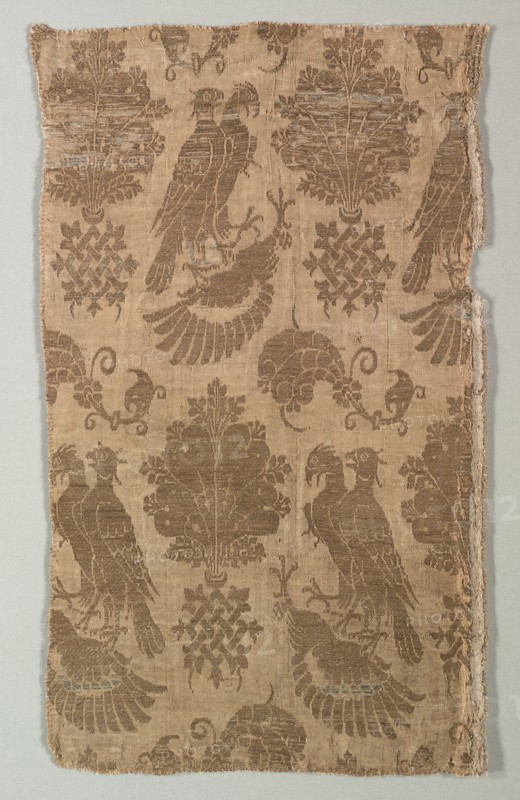 Gold-patterned Silk with Falcons and Heraldry, 1360-1400. Italy, last third of 14th century. Silk, gold thread; a combination of two weaves (lampas); overall: 40 x 24.5 cm (15 3/4 x 9 5/8 in.)