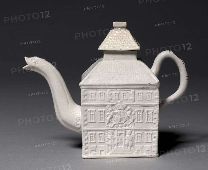 Teapot, 1740-1750. Staffordshire Factory (British), Aaron Wood (British). Salt-glazed earthenware; overall: 14.6 x 18.8 cm (5 3/4 x 7 3/8 in.); container: 11.5 cm (4 1/2 in.).