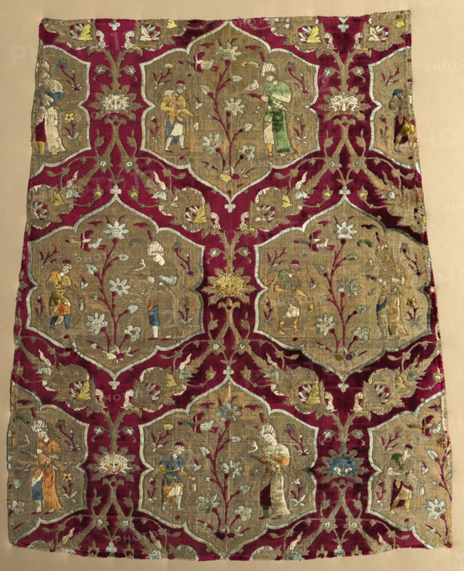 Brocaded velvet with falconer and attendant in animated lattice, from a robe, mid 1500s. Iran, Kashan, Safavid period. Velvet, brocaded and pile-warp substitution: silk and gilt-metal thread; overall: 79.4 x 66.7 cm (31 1/4 x 26 1/4 in.).