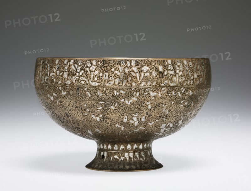 The Wade Cup with Animated Script, 1200-1221. Iran, Seljuk Period, 13th Century. Brass inlaid with silver; diameter: 16.1 cm (6 5/16 in.); overall: 11.5 cm (4 1/2 in.).