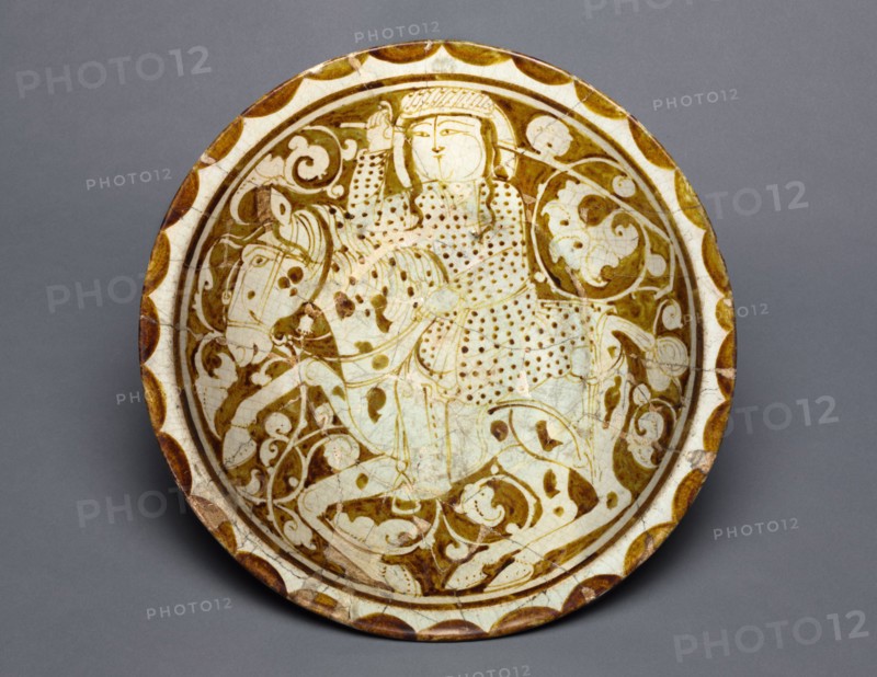 Luster Dish with Polo Player, 1170-1200. Iran, Kashan, Seljuk period, late 12th-early 13th Century. Fritware with luster-painted design; overall: 7.2 x 35.5 cm (2 13/16 x 14 in.).