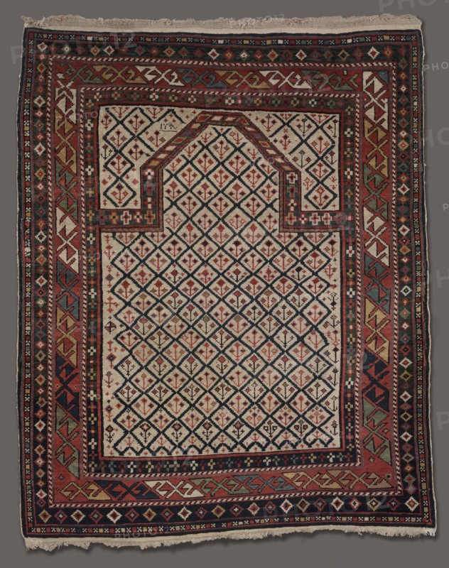 Prayer Rug, c. 1800s. Caucasus, Daghestan, 19th century. Wool and linen; ghiordes knot, extended tabby, fringe; overall: 102.9 x 127 cm (40 1/2 x 50 in.).
