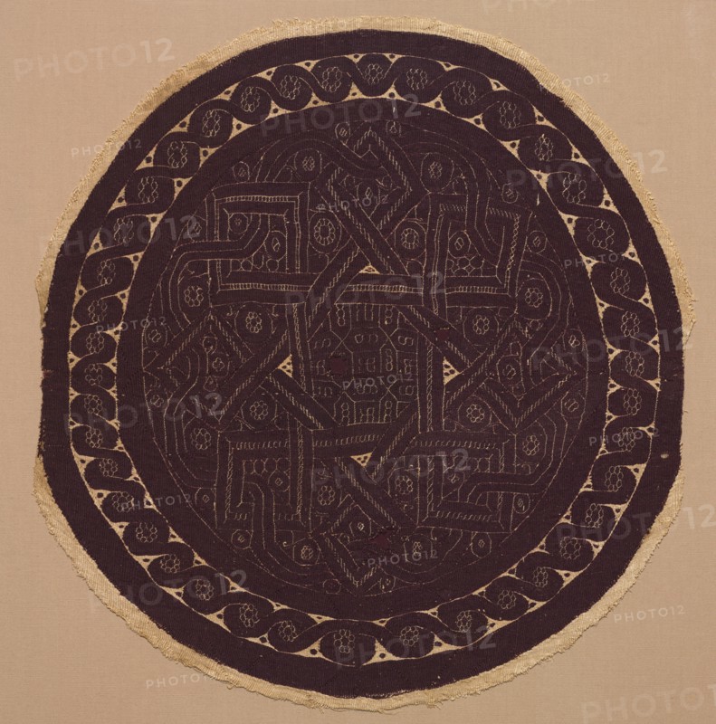 Roundel from a Curtain, 300s. Egypt, Byzantine period, 4th-5th century. Plain weave ground with tapestry weave and supplementary weft wrapping; undyed linen and dyed wool; overall: 45.2 x 47.7 cm (17 13/16 x 18 3/4 in.); mounted: 64.1 x 64.1 x 2.5 cm (25 1/4 x 25 1/4 x 1 in.)