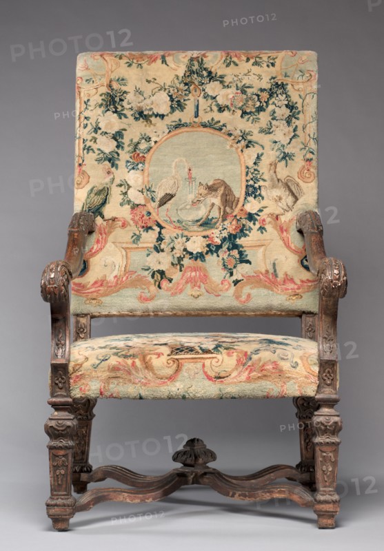 Chair, before 1717. Royal Savonnerie Manufactory, Chaillot Workshops (French, est. 1627). Carved wood, Savonnerie knotted-pile (symmertrical rug knot) upholstery; wool, hemp; overall: 121.9 x 70.5 x 55.3 cm (48 x 27 3/4 x 21 3/4 in.).