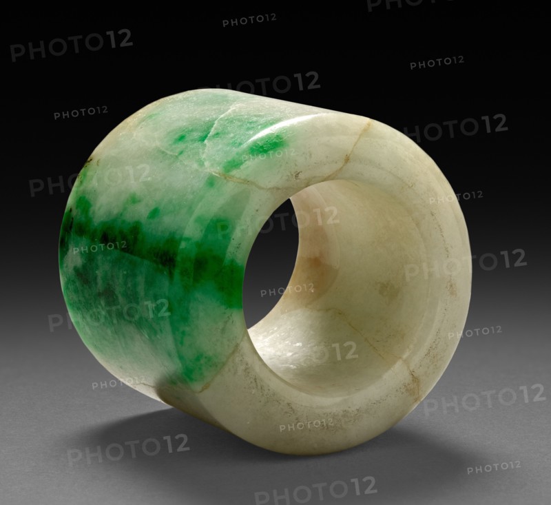 Thumb Ring, 1800s-1900s. China, 19th-20th century. White and green jade; diameter: 3.1 cm (1 1/4 in.); overall: 2.6 cm (1 in.).
