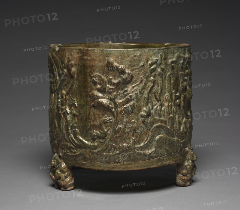 Cylindrical Jar, 202 BC-AD 220. China, Han dynasty (202 BC-AD 220). Lead glazed earthenware with molded relief; diameter: 27.3 cm (10 3/4 in.); height: 26.7 cm (10 1/2 in.).