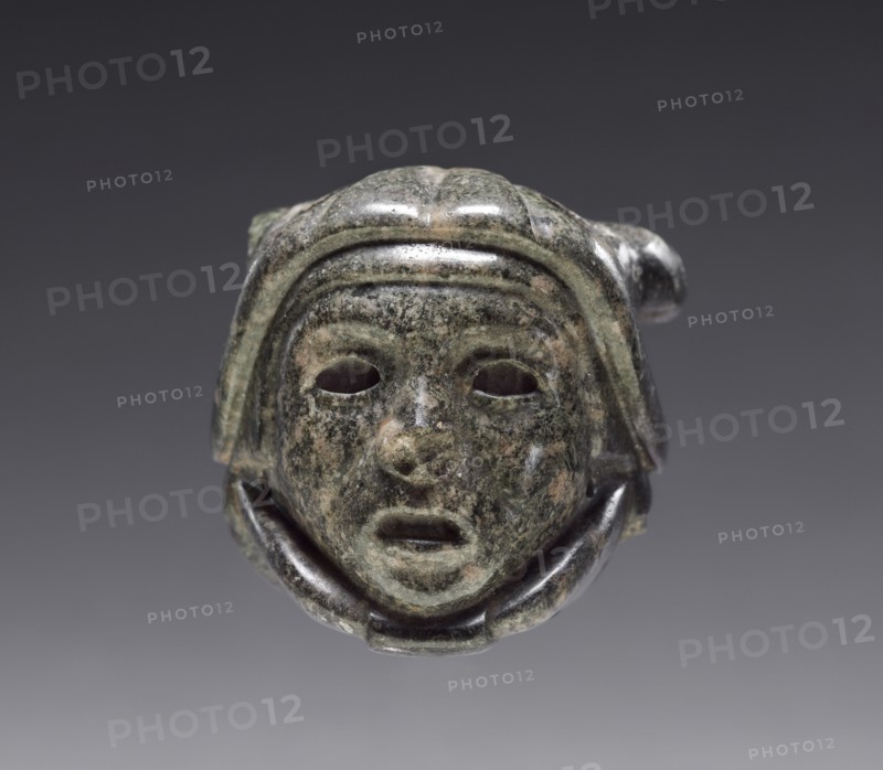 Head in Mouth of Snake, 1325-1519. Central Mexico, Aztec, Post-Classic Period. Greenstone; overall: 5.4 x 5.3 x 4.8 cm (2 1/8 x 2 1/16 x 1 7/8 in.).