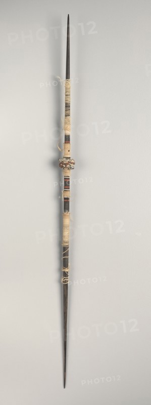 Spindle, c. 1st-3rd century. Peru, South Coast, Nasca style, early period. Wood with carved clay whorl; overall: 32.3 x 1.6 x 1.6 cm (12 11/16 x 5/8 x 5/8 in.)