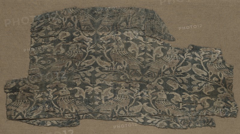 Fragment, late 1100s or early 1200s. Iran, Rayy, late 12th or early 13th century. Lampas weave, silk; overall: 15.2 x 33.6 cm (6 x 13 1/4 in.)