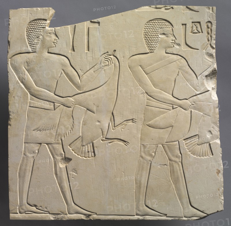 Prophet and Lector-Priest with Offerings of Live Geese, c. 667-647 BC. Egypt, Thebes, Late Period, Dynasty 26. Limestone; overall: 36.8 x 36.6 cm (14 1/2 x 14 7/16 in.).
