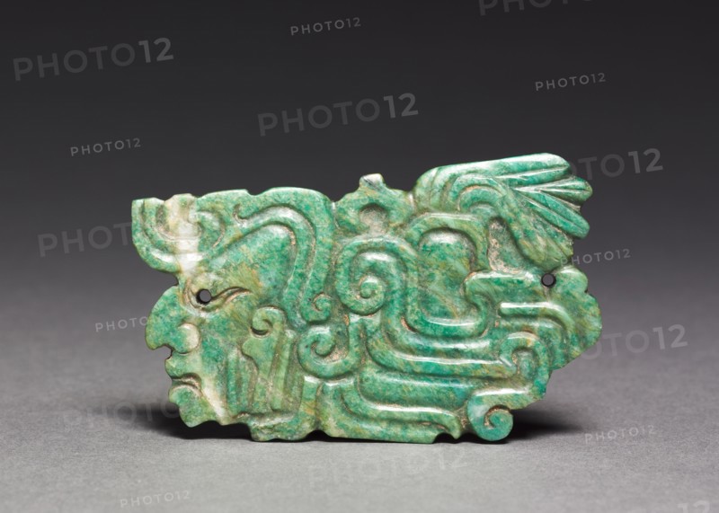 Ornament, 250-900. Mexico or Central America, Maya style (250-900). Greenstone; overall: 4.8 x 8 cm (1 7/8 x 3 1/8 in.).