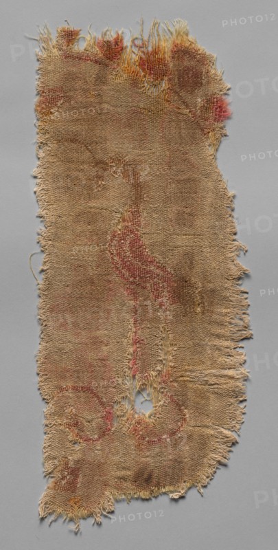 Two Fragments of Large Scale Roundel, 600s. Iran, 7th century. Compound twill; wool and cotton; overall: 15 x 40.5 cm (5 7/8 x 15 15/16 in.)