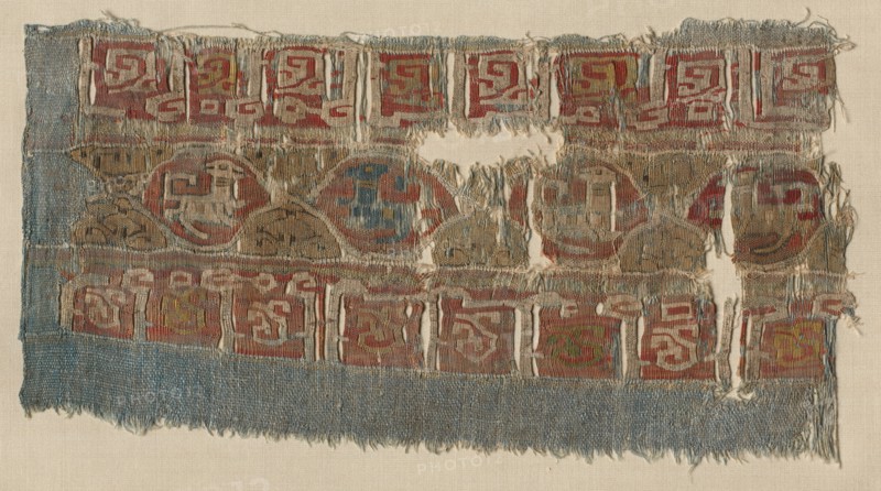 Fragment of a Tiraz-Style Textile, 1081 - 1094. Egypt, Fatimid period, latter part of Caliphate of al-Mustansir, c. AH 475-487 (A.D. 1081-1094). Tabby ground with inwoven tapestry ornament; linen and silk; overall: 14 x 26.4 cm (5 1/2 x 10 3/8 in.)