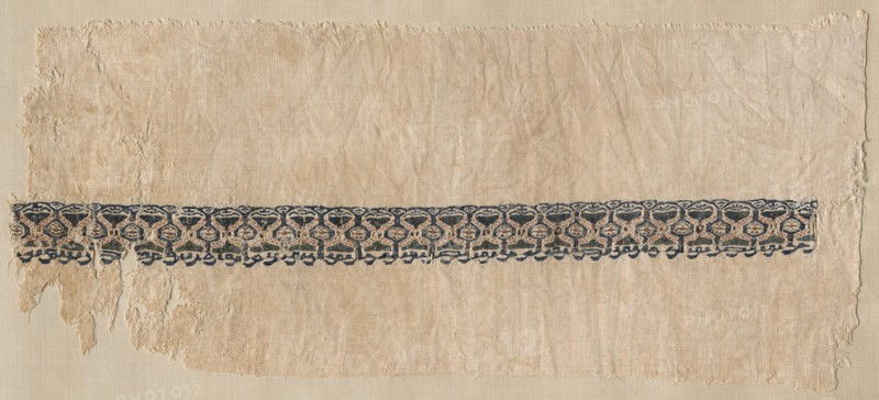Fragment of a Tiraz-Style Textile, 1094 - 1101. Egypt, Fatimid period, Caliphate of al-Musta'li, AH 487-495 (A.D. 1094-1101). Tabby ground with inwoven tapestry ornament; linen and silk; overall: 16.5 x 36.5 cm (6 1/2 x 14 3/8 in.)
