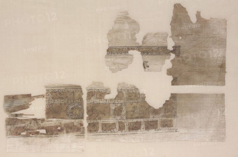 Fragment with tripartite band, 1000s - 1100s. Iran or Iraq, Seljuq period. Plain weave: silk warp and cotton weft (mulham); gold leaf and ink; overall: 18.4 x 30.2 cm (7 1/4 x 11 7/8 in.)