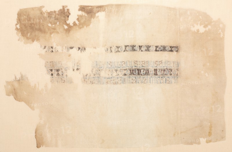 Fragment of a Tiraz, Probably Inset from a Sleeve, 1027 - 1036. Egypt, Fatimid period, Caliphate of al-Zahir, AH 418-427 9A.D. 1027-1036). Tabby ground with inwoven tapestry ornament; linen and silk; overall: 42 x 62.6 cm (16 9/16 x 24 5/8 in.)