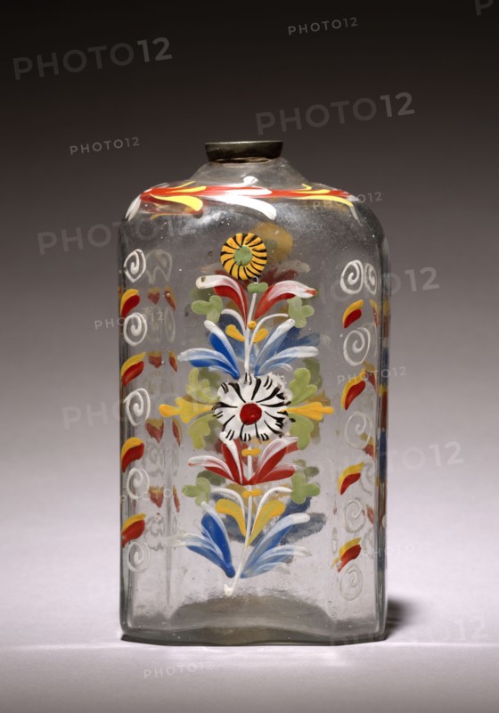 Enameled Bottle, 1700s. America, Stiegel Type, 18th century. Glass; diameter: 1.6 cm (5/8 in.); overall: 15.9 x 6.6 x 8.5 cm (6 1/4 x 2 5/8 x 3 3/8 in.).