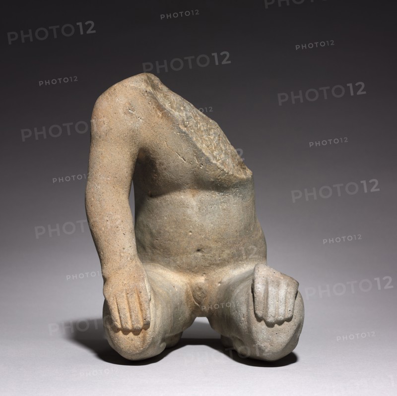 Kneeling Figure, c. 1200-600 BC. Mexico, Guerrero, Olmec, 1200-300 BC. Stone; overall: 26.3 x 20 x 21.3 cm (10 3/8 x 7 7/8 x 8 3/8 in.).